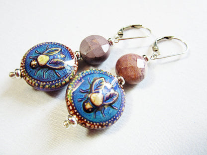 Close-up of Bee Earrings with Natural Stone Moukite Accent Bead, showcasing intricate design and vibrant color-changing features.
