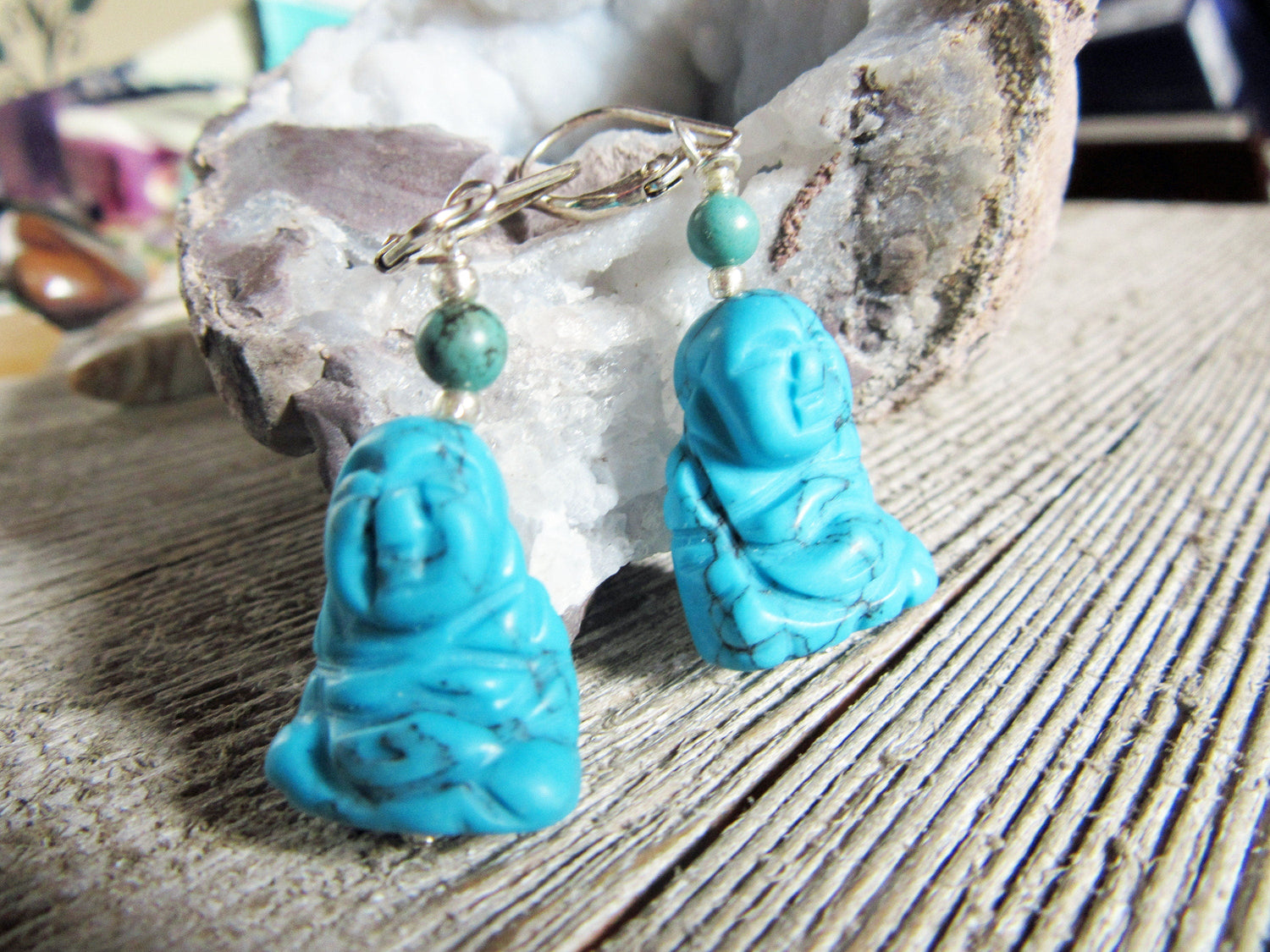 Beautiful display of Smiling Happy Man Zen Earrings, highlighting their unique design and calming essence.