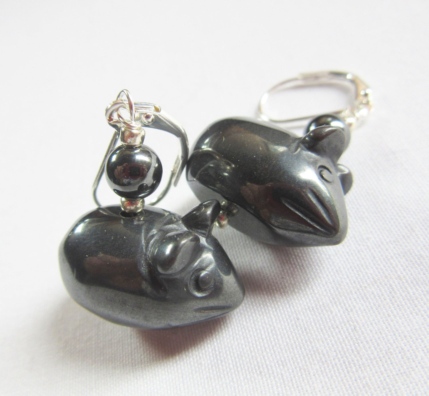 Mouse earrings made of hematite, featuring carved stone animal design, perfect for adding fun to any outfit.
