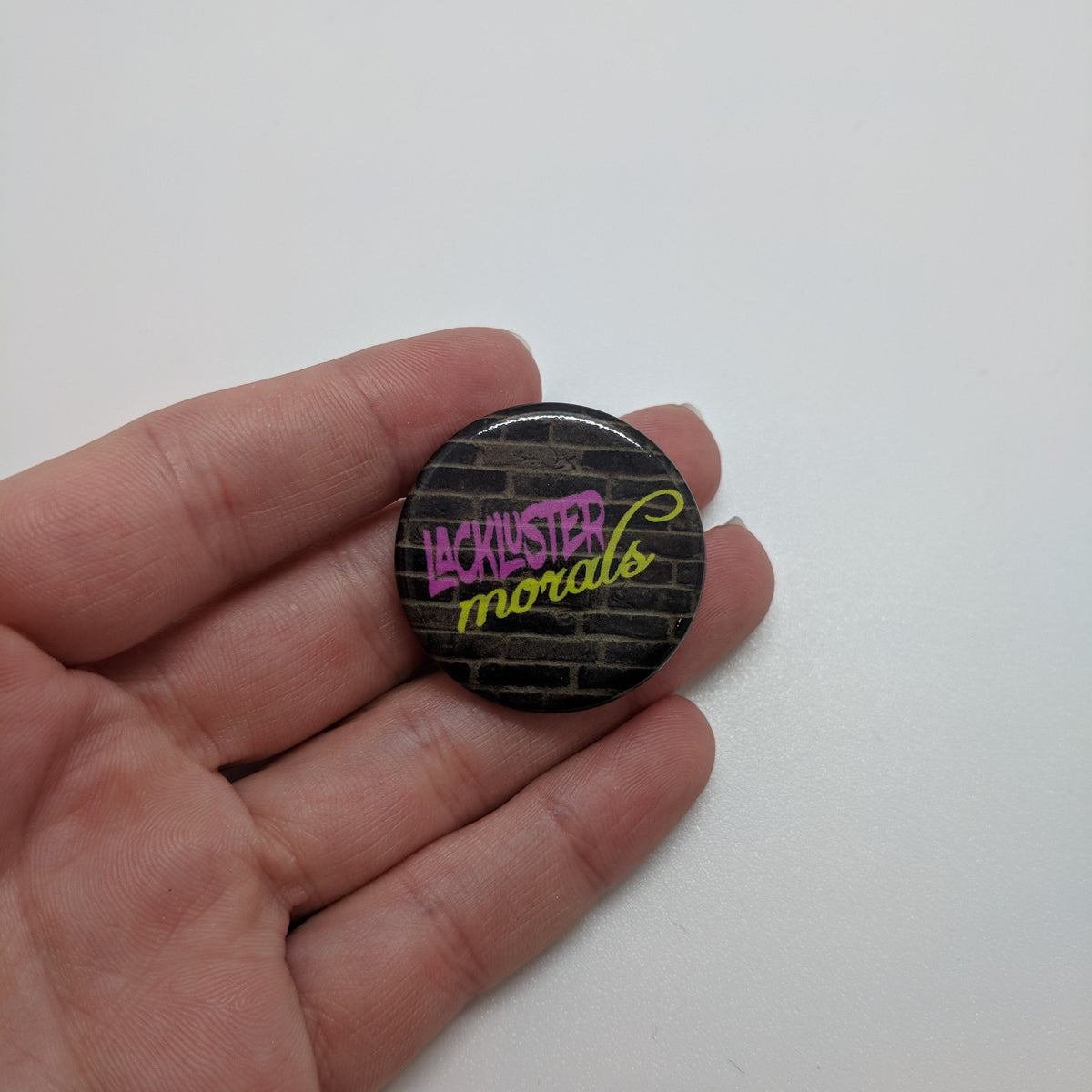 Lackluster Morals button