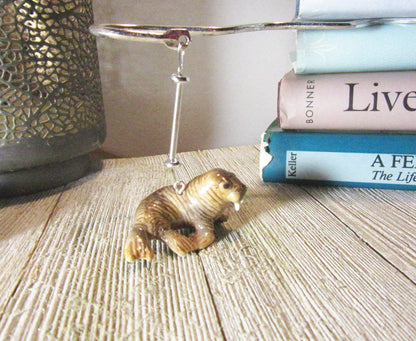 Walrus Lover Bookmark - Porcelain walrus figurine with an 8-inch squiggly metal bookmark, ideal for avid readers and as a fun gift.