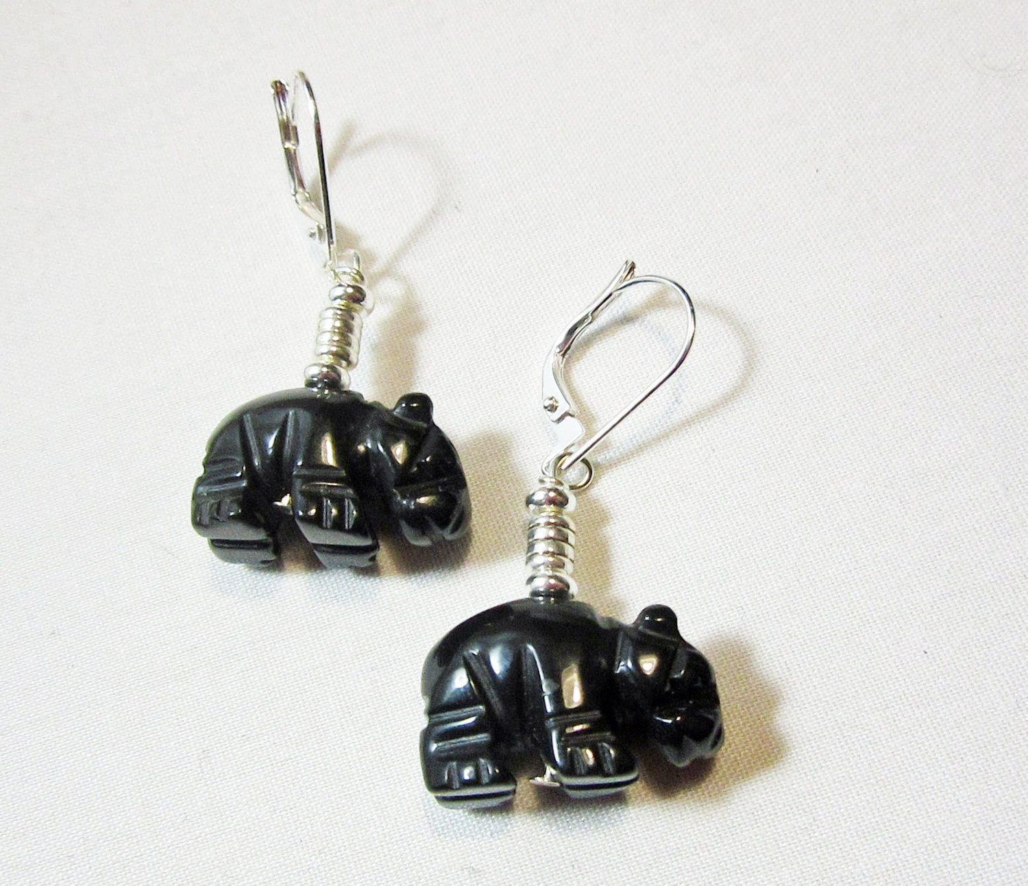 Hippo gift featuring hippo earrings made of carved black onyx stone, perfect for hippopotamus jewelry lovers.