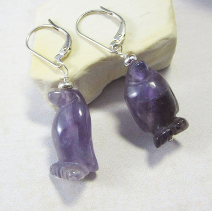 Penguin necklace crafted from amethyst, showcasing a charming purple penguin design, ideal for any penguin lover.