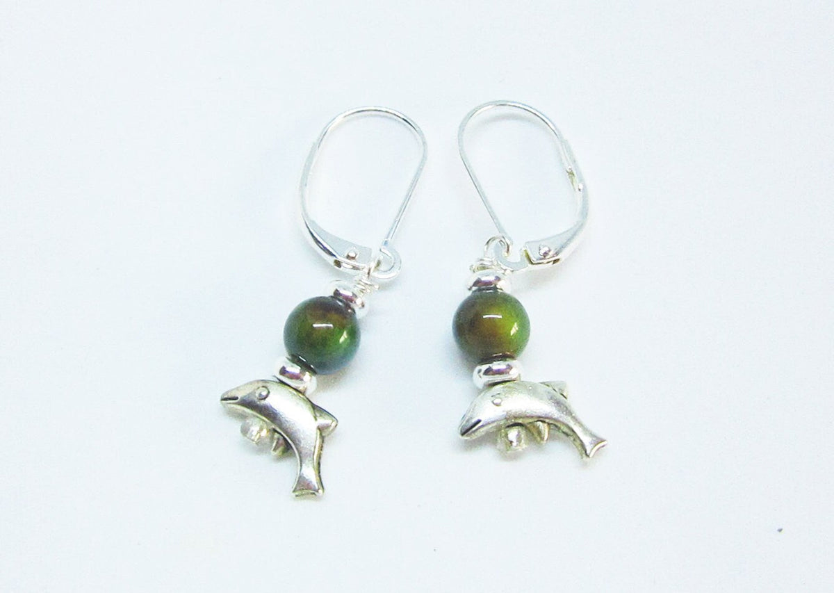 Close-up of Small Silver Animal theme Earrings with color-changing mood bead and dolphin design - Ideal gift for ocean lovers.