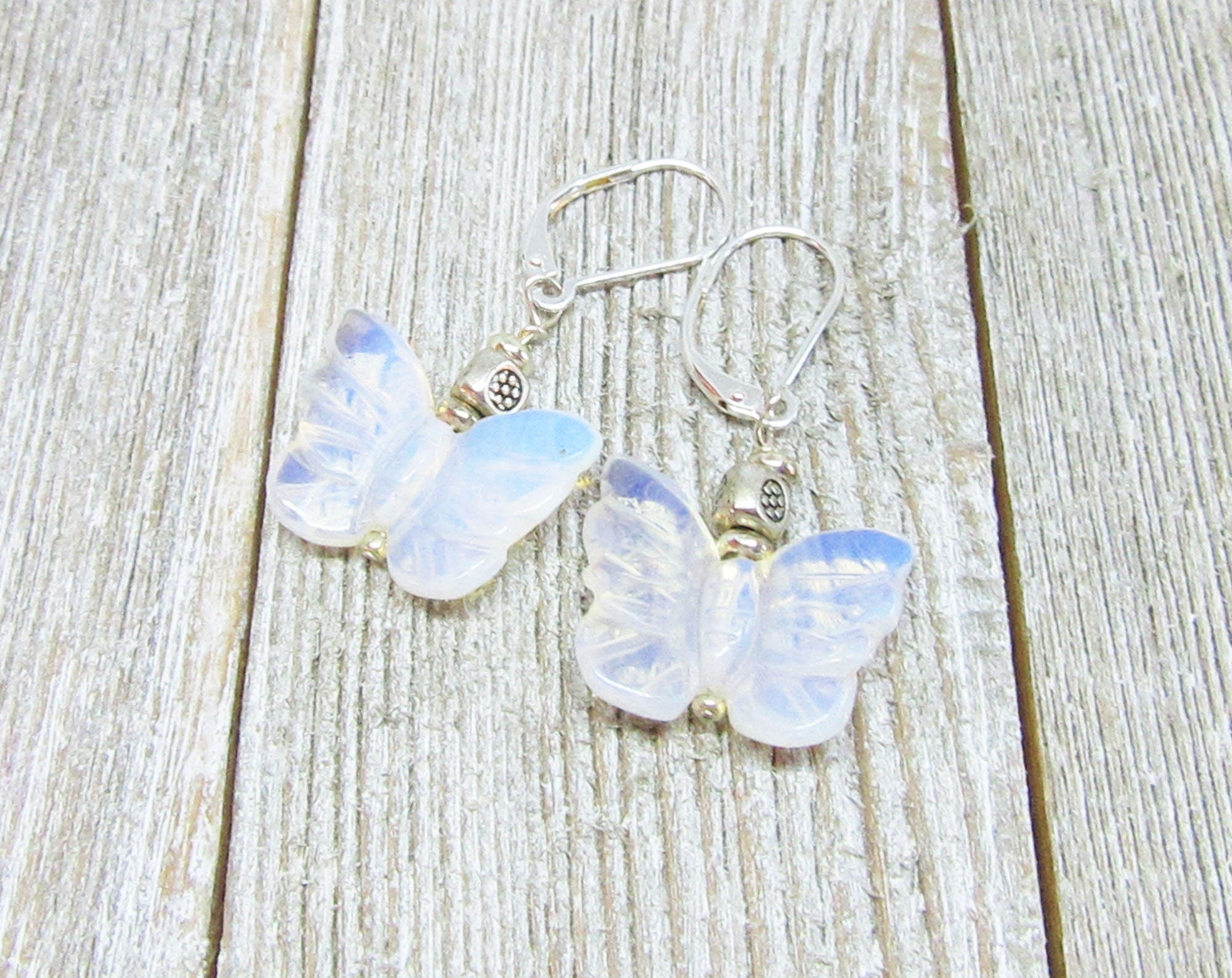 Pink Rose Quartz butterfly earrings - artisan crafted jewelry representing love and gentleness, ideal gift for any occasion.