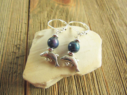 Small Silver Animal theme Earrings displayed on a stylish background, highlighting the dolphin and mood bead topper - Ideal ocean lover gift.