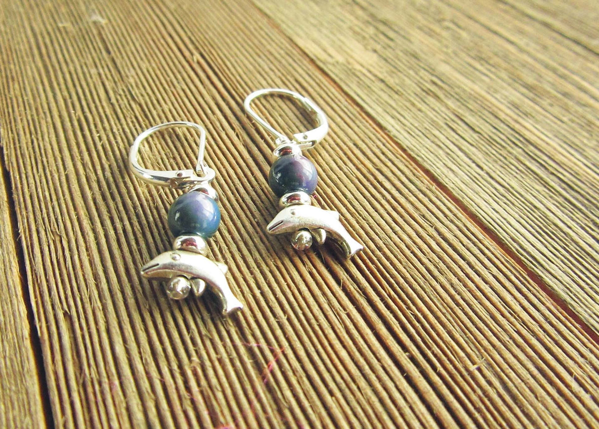 Small Silver Animal theme Earrings featuring a dolphin with mood bead topper - Color change dolphin jewelry, perfect gift for ocean lovers.