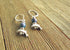 Small Silver Animal theme Earrings featuring a dolphin with mood bead topper - Color change dolphin jewelry, perfect gift for ocean lovers.