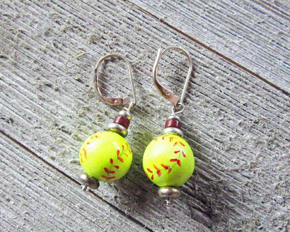 Novelty Optic Ball Earrings - Sports-themed jewelry ideal for softballs fans with ceramic and FIMO clay materials.