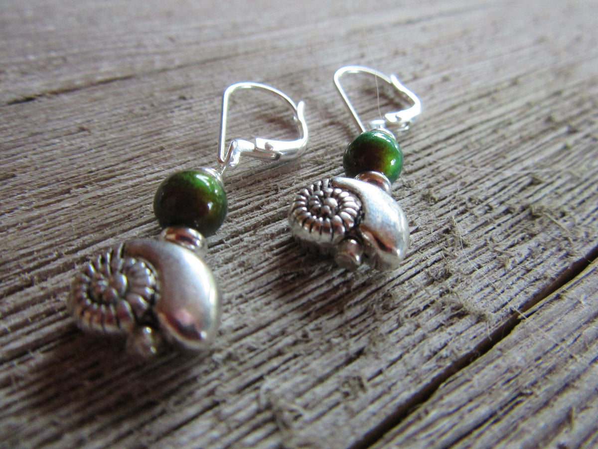 SEA SHELL EARRINGS - Silver Shell Earring showcasing intricate design and color changing beads, perfect gift for women and boho style lovers.