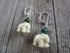 Elephant Earrings – Boho Mood Beads feature cream elephant charms and a sterling silver color change topper bead, displayed on rustic wood. Only one pair available.