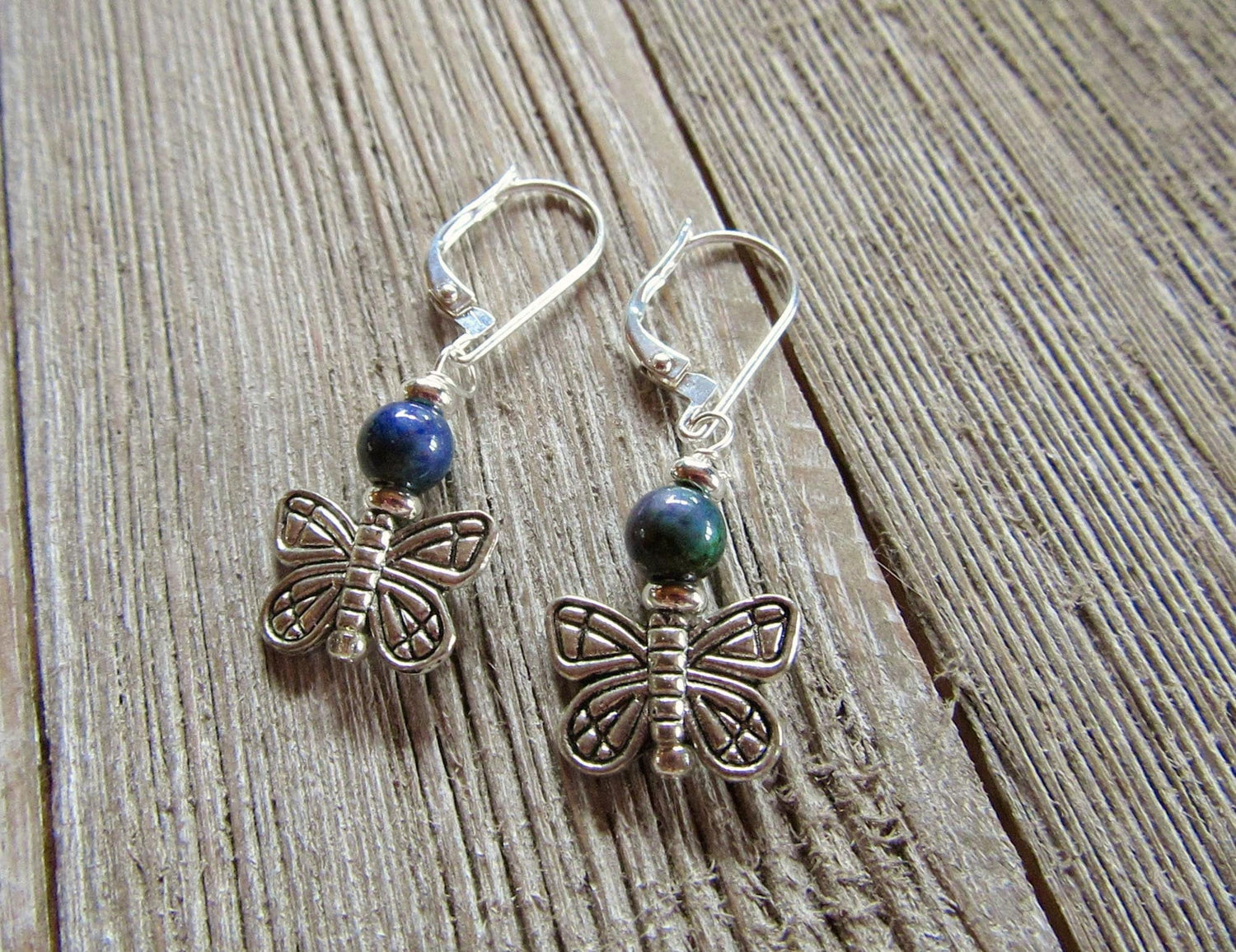 Delicate silver woodland animal earrings with color changing beads, a charming gift for any teen girl.