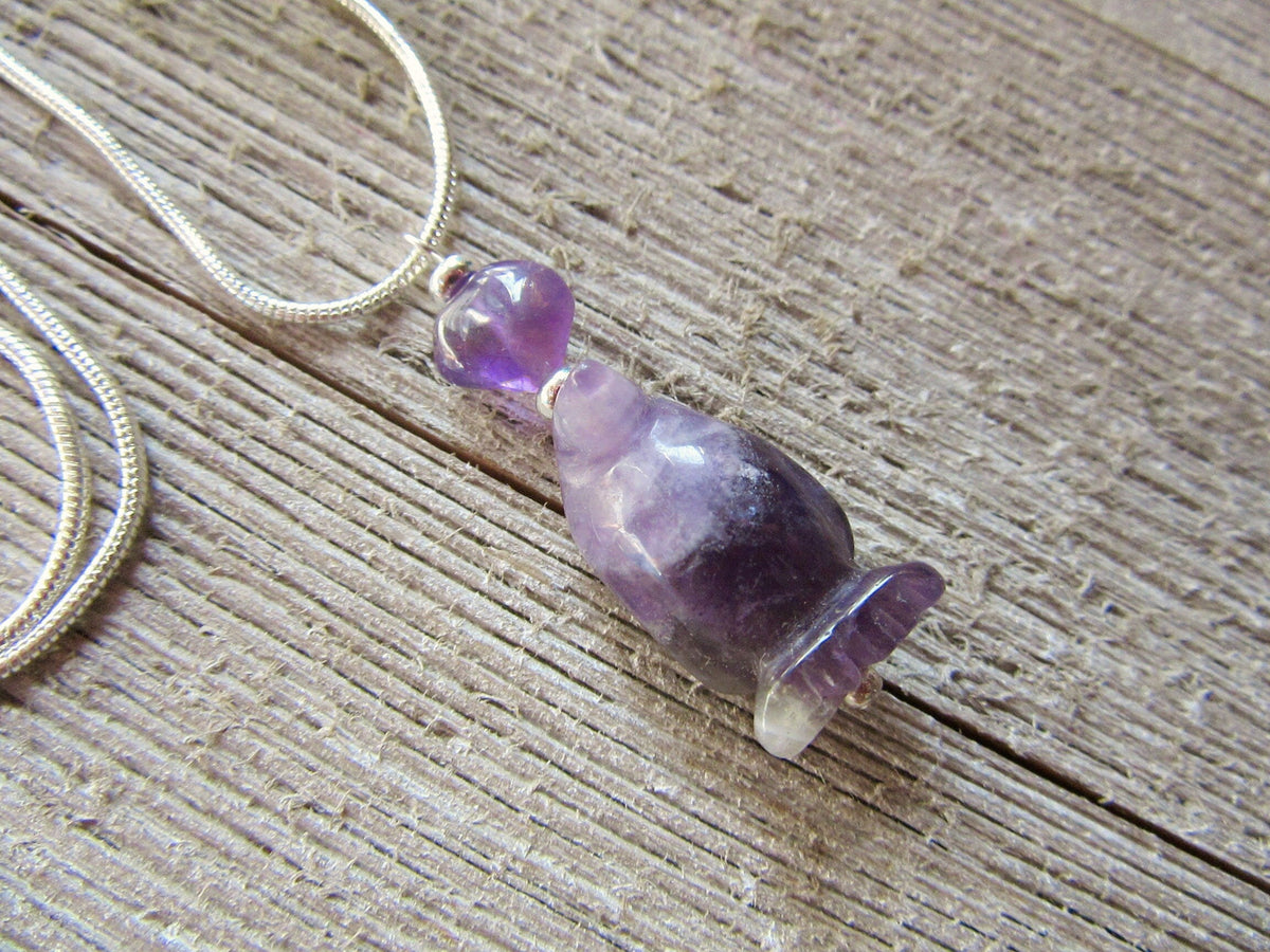 Purple penguin earrings made of amethyst, featuring a cute carved stone animal design, perfect funny gift for her.