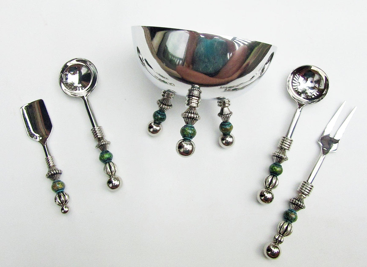 Elegant party serving set including a teaspoon and soft cheese spreader in custom stainless steel design.