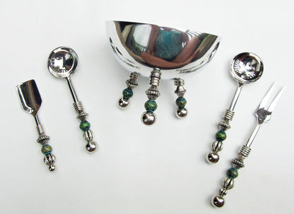 Elegant party serving set including a teaspoon and soft cheese spreader in custom stainless steel design.