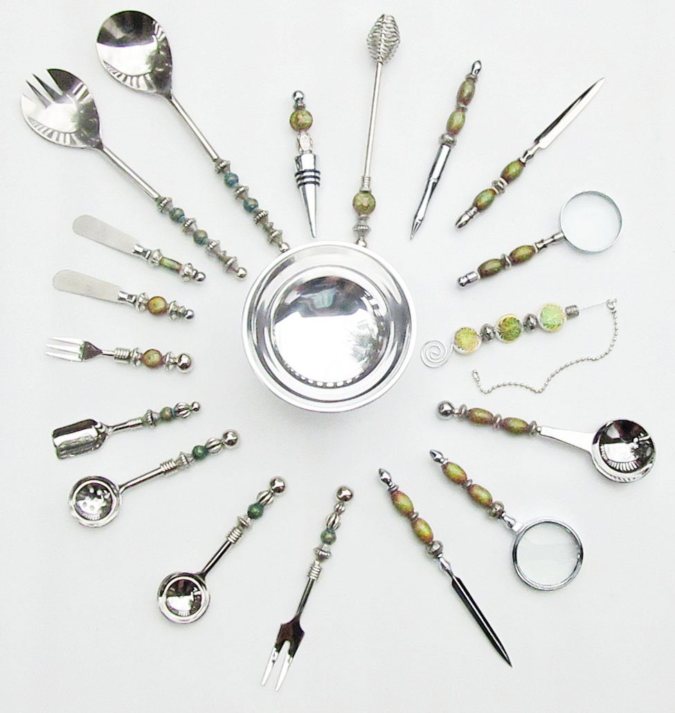 Versatile party serving set with olive fork and matching stainless steel utensils, ideal for any gathering.
