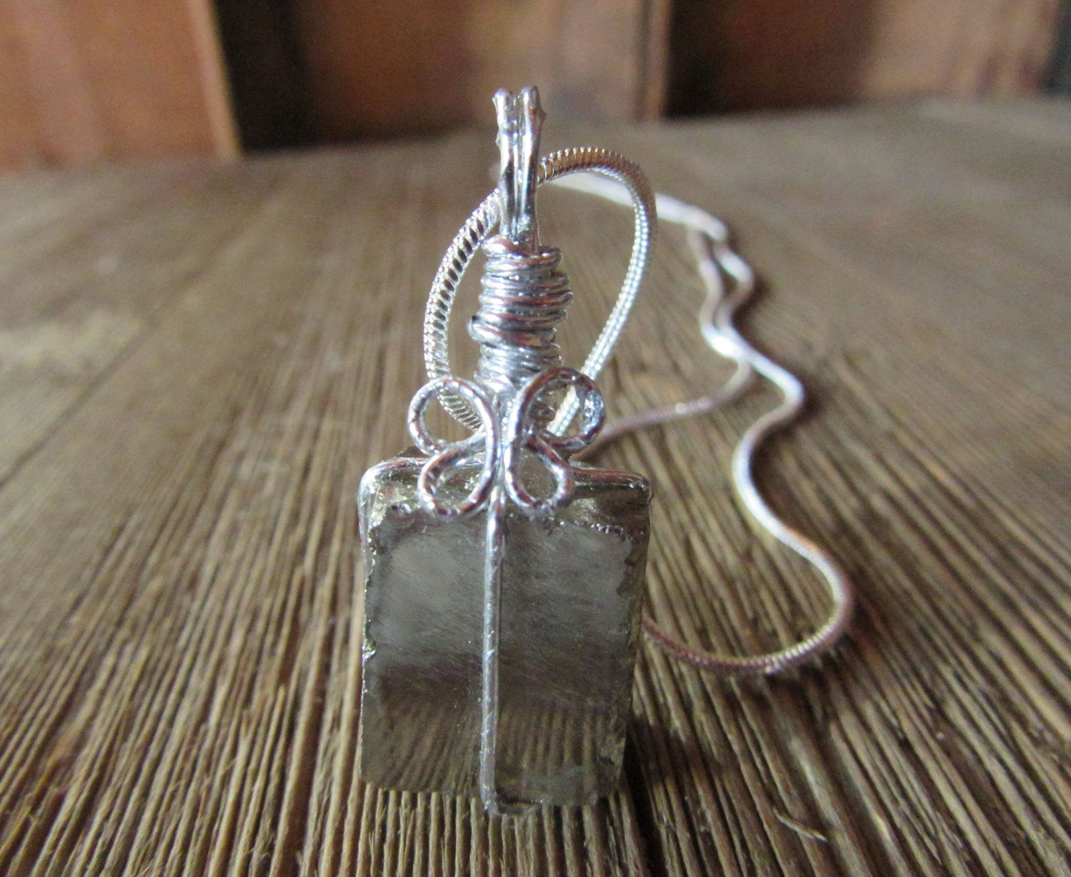 Stunning Pyrite Crystal Pendant in a chunky gold necklace design, showcasing the wire-wrapped choker, perfect for metaphysical and zen aesthetic gift.