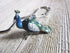 Peacock Bookmark, porcelain figurine with colorful peacock design, perfect for book lovers and readers.
