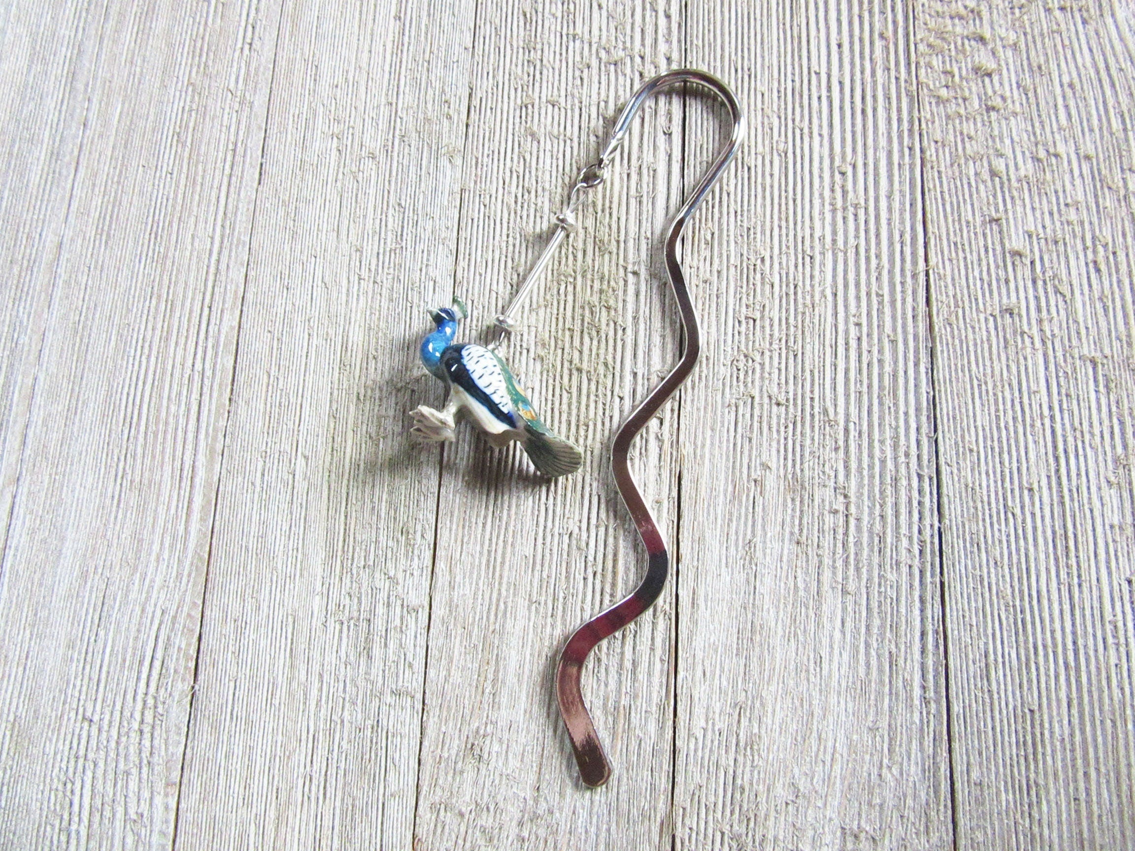 Peacock Bookmark, a charming metal bookmarker featuring a beautifully painted peacock, ideal gift for readers.