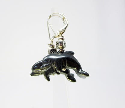 Dolphin Earrings Carved Black Hematite - Beautifully crafted dolphin earrings showcasing the unique shades of black hematite.