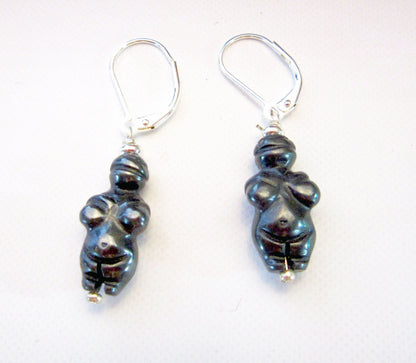 Close-up view of the Goddess earrings inspired by the Venus of Willendorf, showcasing the elegant carved sodalite and primitive style for an ancient soul.