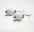 Golf Earrings a Gift for Woman Golfer, showing fun novelty golf ball jewelry.