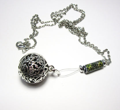 Close-up of Diffuser Necklace showcasing floral pendant and colorful lava beads, highlighting its essential oil diffuser capabilities and elegant design.