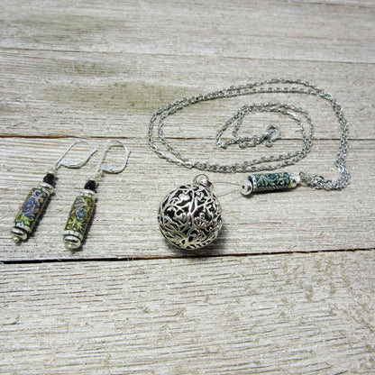 Close-up of the Diffuser Necklace showing the essential oil jewelry design with vibrant floral patterns and color-changing lava beads, a meaningful gift for her.