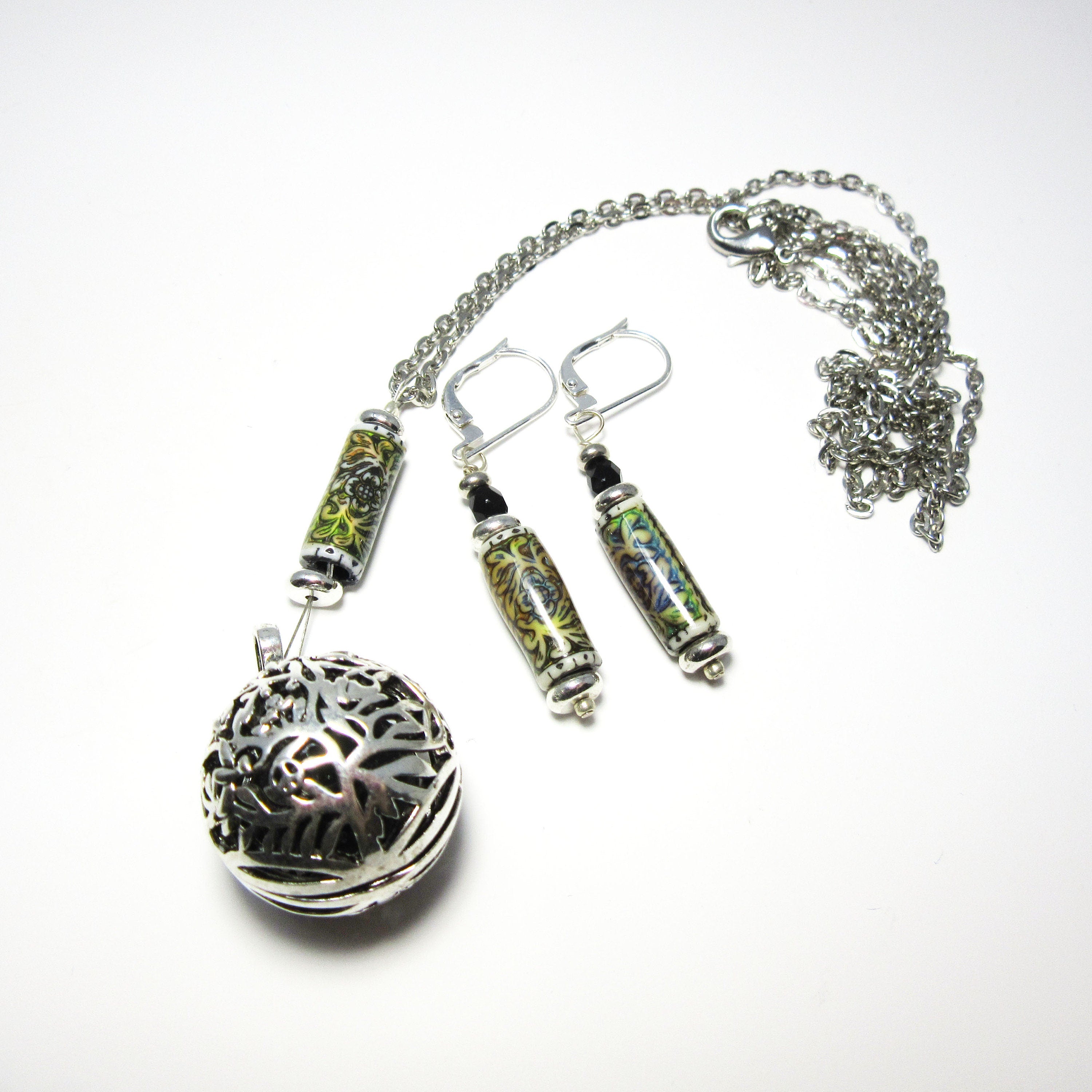 Diffuser Necklace featuring a floral pendant, handcrafted essential oil jewelry, aromatherapy locket adorned with lava beads, perfect gift for her.