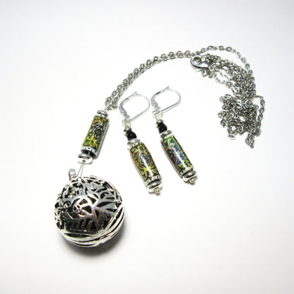 Diffuser Necklace featuring a floral pendant, handcrafted essential oil jewelry, aromatherapy locket adorned with lava beads, perfect gift for her.
