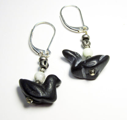 Carved stone earrings inspired by songbirds including a duck and goose, ideal accessory for nature lovers and bird watchers.