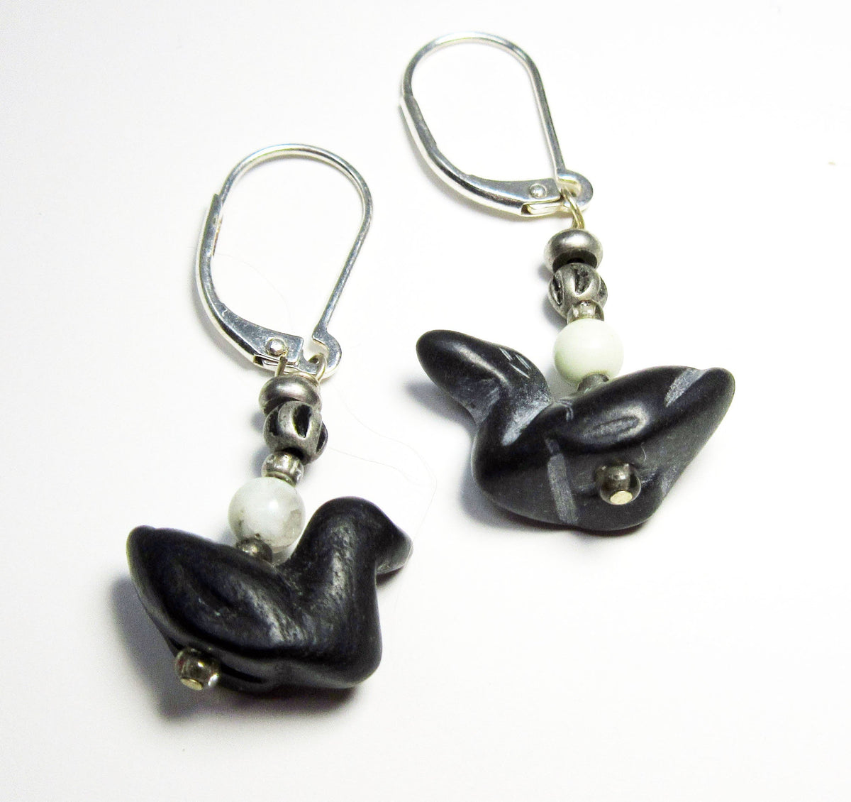 Carved stone earrings inspired by songbirds including a duck and goose, ideal accessory for nature lovers and bird watchers.