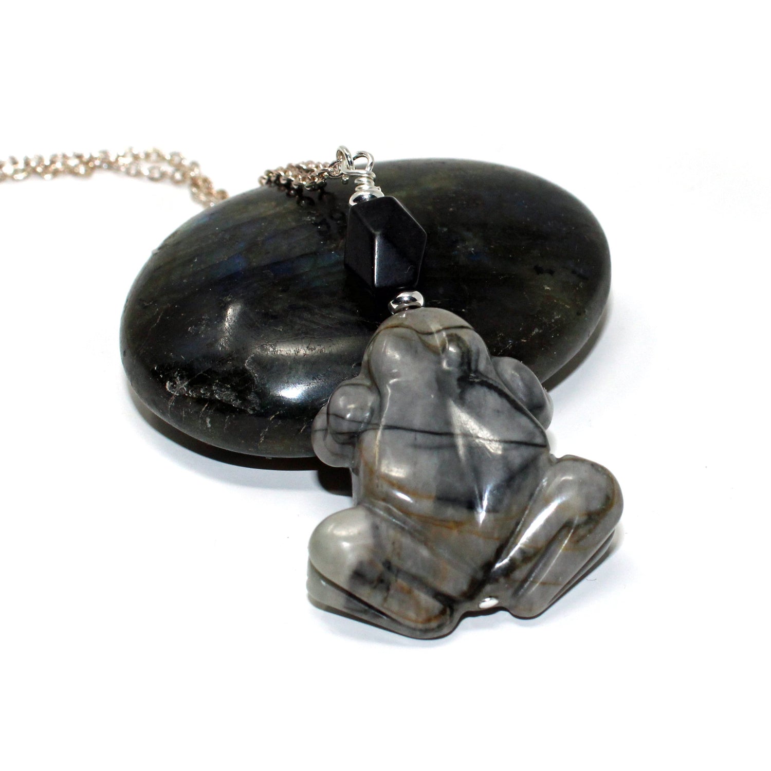 Close-up of Frog Pendant - Carved Picasso Jasper Jewelry, showcasing the intricate details and smooth finish.