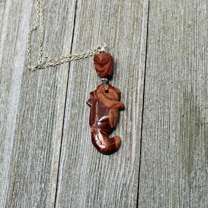SEA HORSE PENDANT - Handcrafted Red Jasper Seahorse Jewelry displayed on a leather cord, suitable for both men and women.