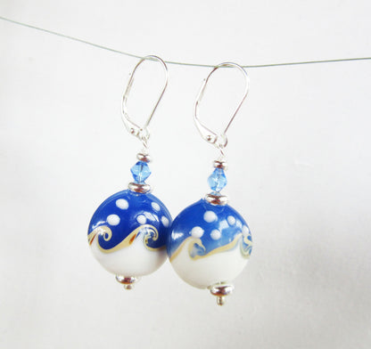 Ocean Wave Earrings say Hello - close-up of unique, handcrafted glass earrings, a perfect accessory for water women.