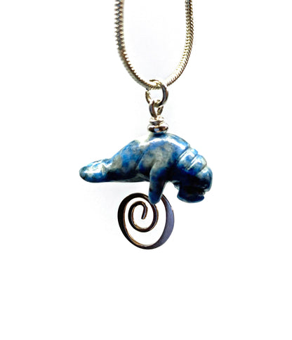 Manatee Blue Necklace displayed on a silver snake chain, perfect gift for animal lovers.
