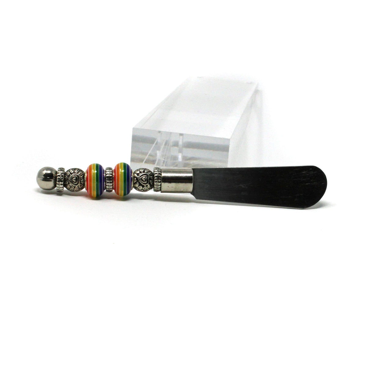 Soft cheese spreader knife featuring a unique style with colorful beads, perfect for chutney, ideal gift for Rainbow Pride, and a fun kitchen accessory.