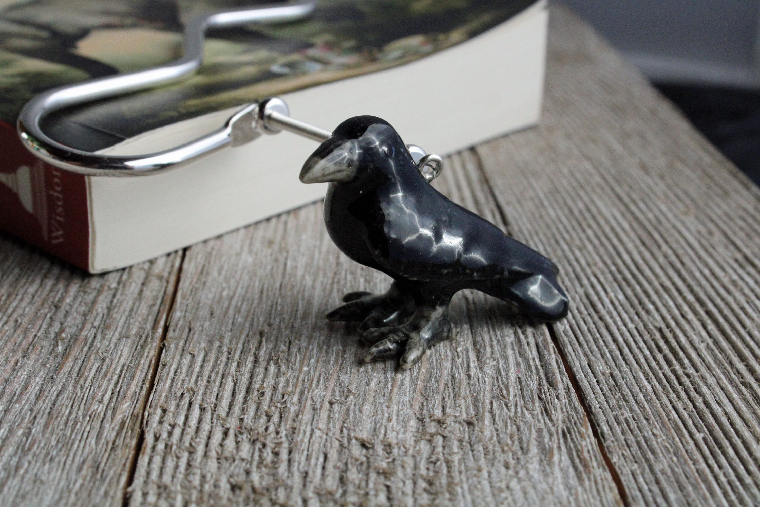 RAVEN BOOKMARK - Handcrafted metal bookmark featuring a raven figurine, perfect for book lovers.