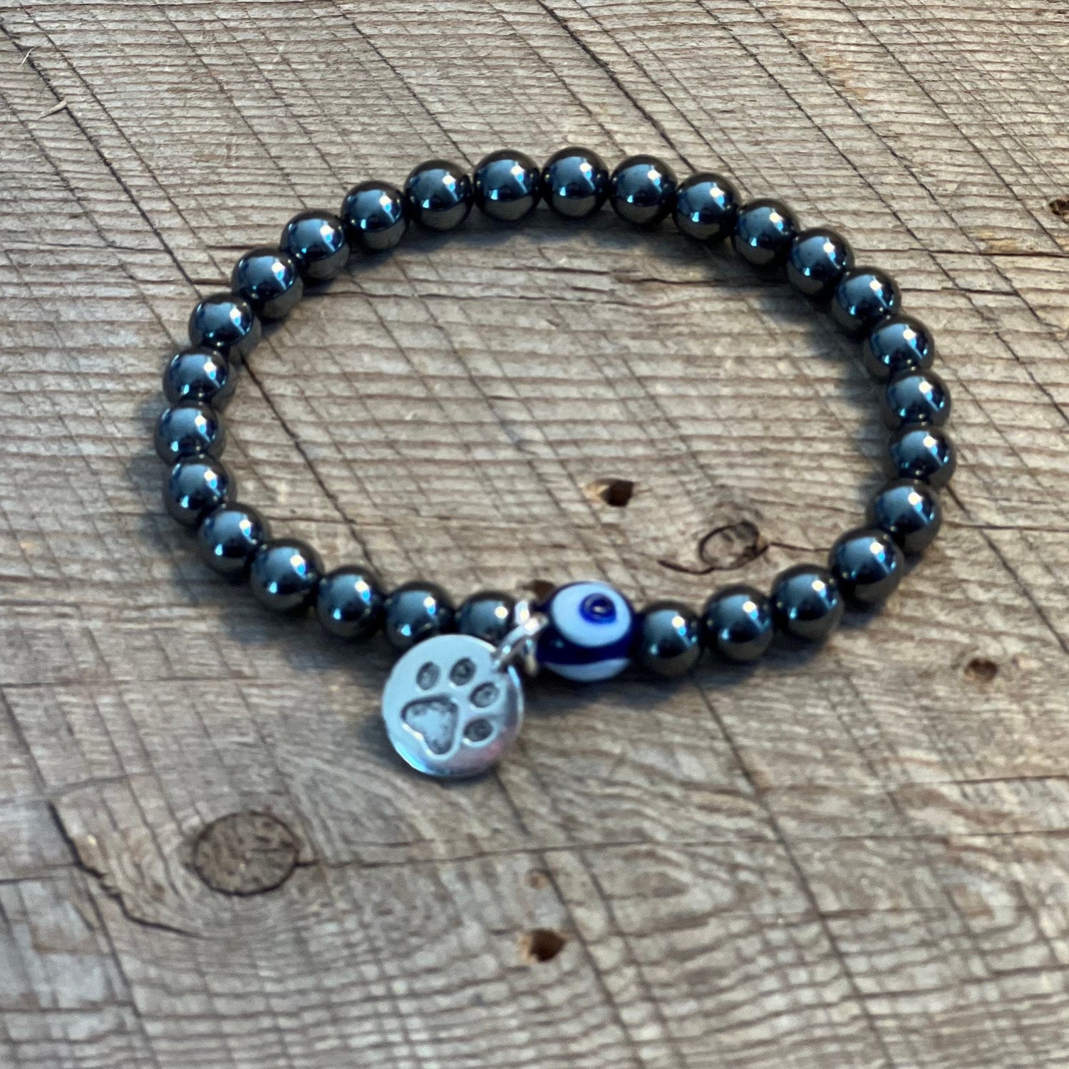 SariBlue® Hematite and Evil Eye Bracelet with Pewter Paw Print Charm