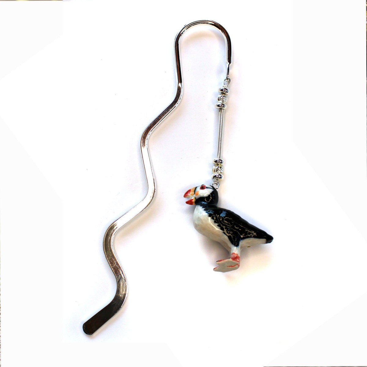 Close-up of the Puffin Bird metal bookmark emphasizing its unique squiggly design, ideal for book lovers and bird enthusiasts.