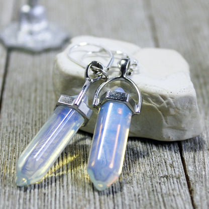 Stylish presentation of the Opalite Wand Pendant necklace and earrings set with rose quartz or moonstone base in an elegant setup.