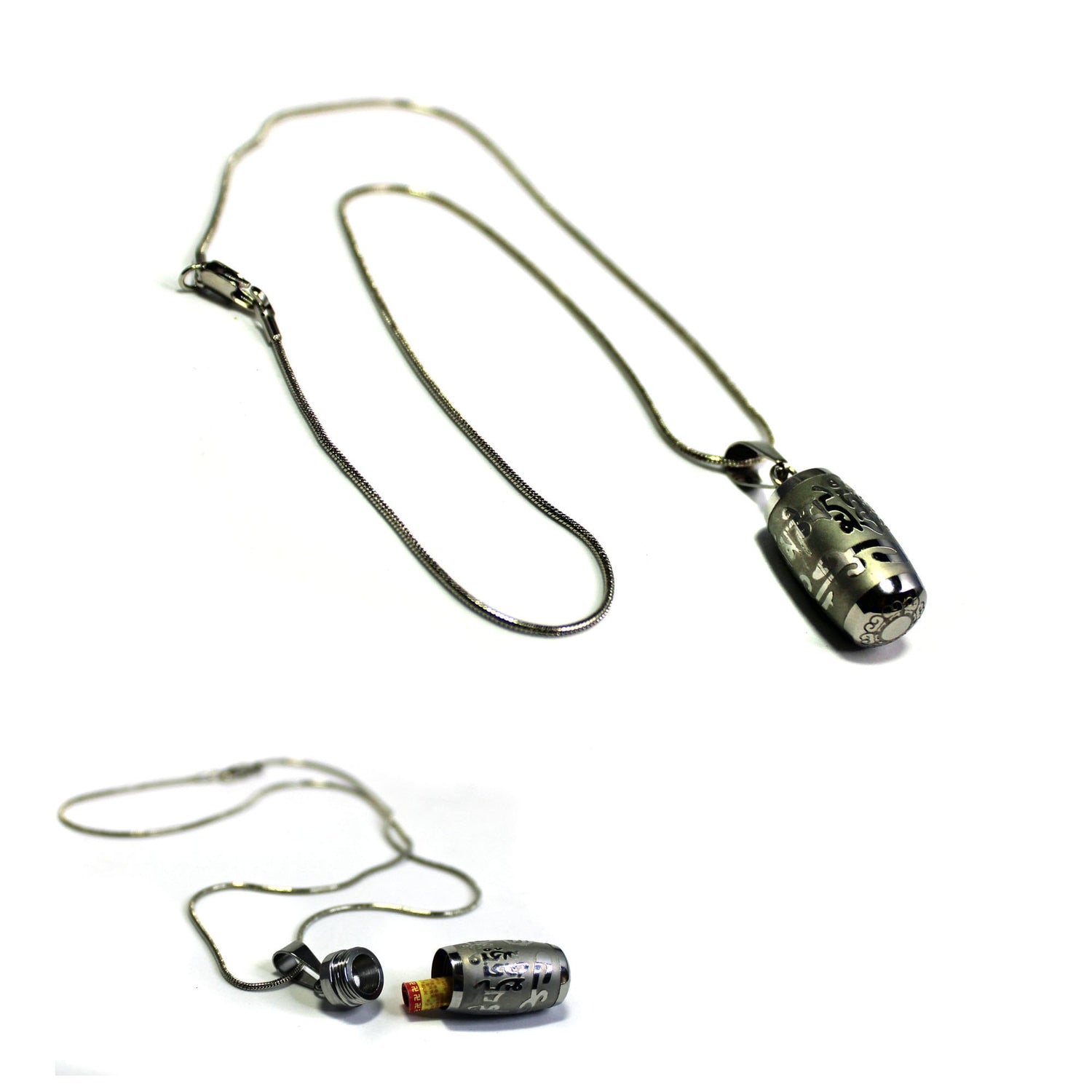 The Silver Prayer Box Necklace features a cylindrical pendant with a secret chamber for small notes or essential oils. This Zen jewelry piece, engraved and set against a white background, is perfect as unique meditation jewelry.