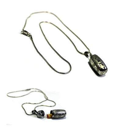 Close-up view of the SECRET CHAMBER Reflection Barrel Necklace showcasing its zen style design, includes a 22 inch chain, ideal for spiritual wear.