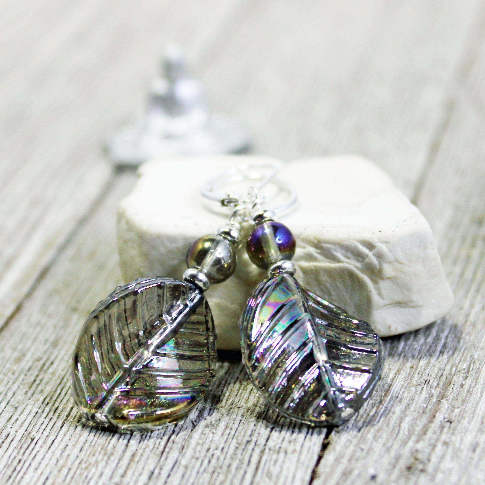 Crystal Leaf Earrings showcasing art glass aurora borealis with a shimmering AB finish in gray and pastel tones. Perfect nature aesthetic gift.