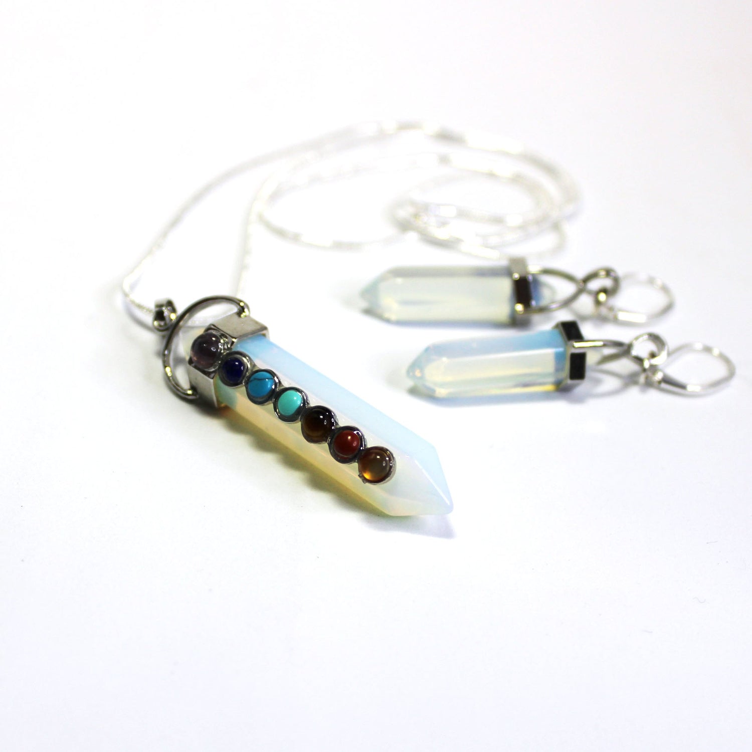 Opalite Wand Pendant with chakra stones showcasing beautiful opalite and chakra stones in a stunning necklace and earrings set.