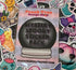 Mystery Spooky Sticker Pack words in a crystal ball design cover for a sticker pack with a pile of spooky stickers under it. Great Halloween gift for all ages