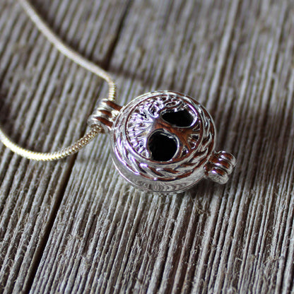 HEART AROMATHERAPY necklace featuring a lotus flower locket style, essential oil jewelry with a silver snake chain and lava bead for personal customization.