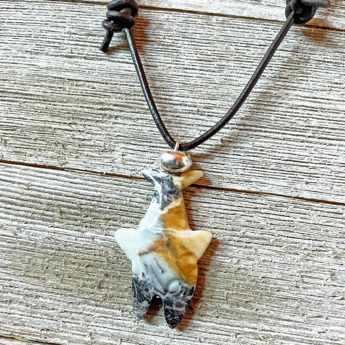 Close-up view of Shark Pendant Carved Amazonite Necklace showcasing unique stone details, ideal for unisex jewelry lovers.