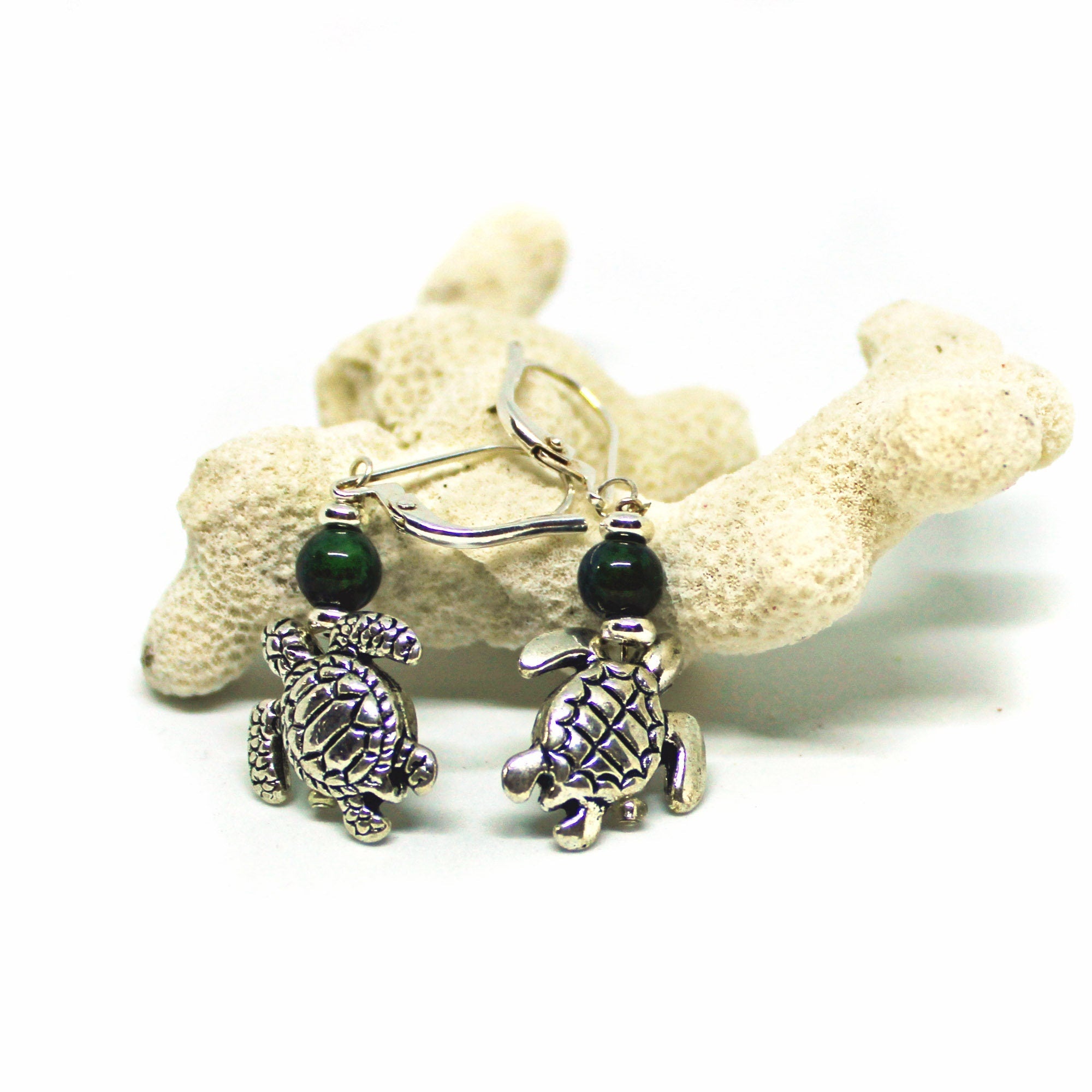 Close-up of Sea Turtle Earrings showing sterling silver lever backs and colorful mood bead toppers.