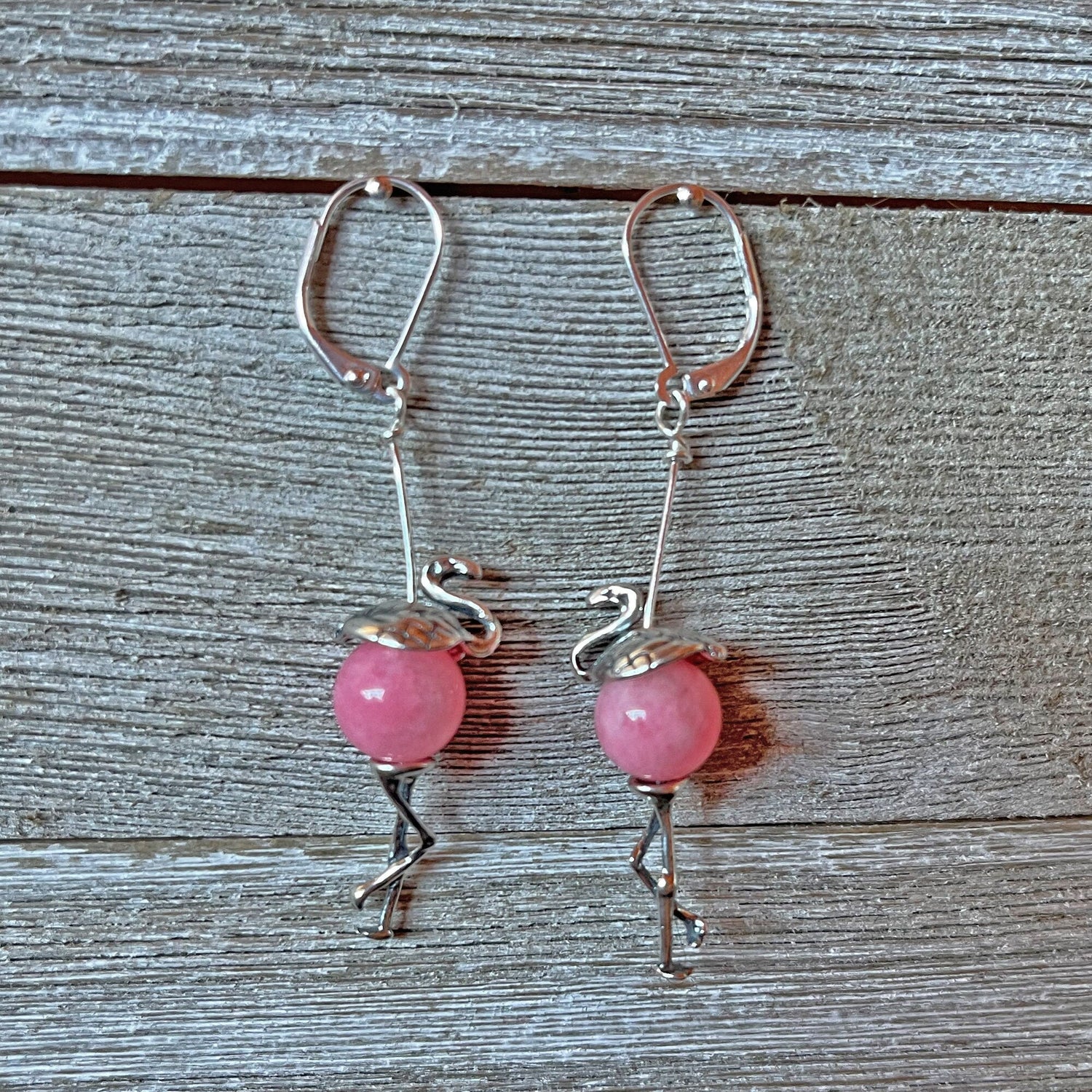Close-up of Funny Pink Flamingo Earrings showcasing the detailed craftsmanship and pink quartz centers, ideal for flamingo lovers.